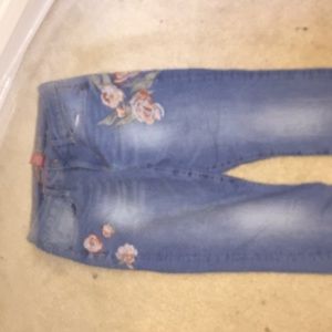 jeans with roses on them